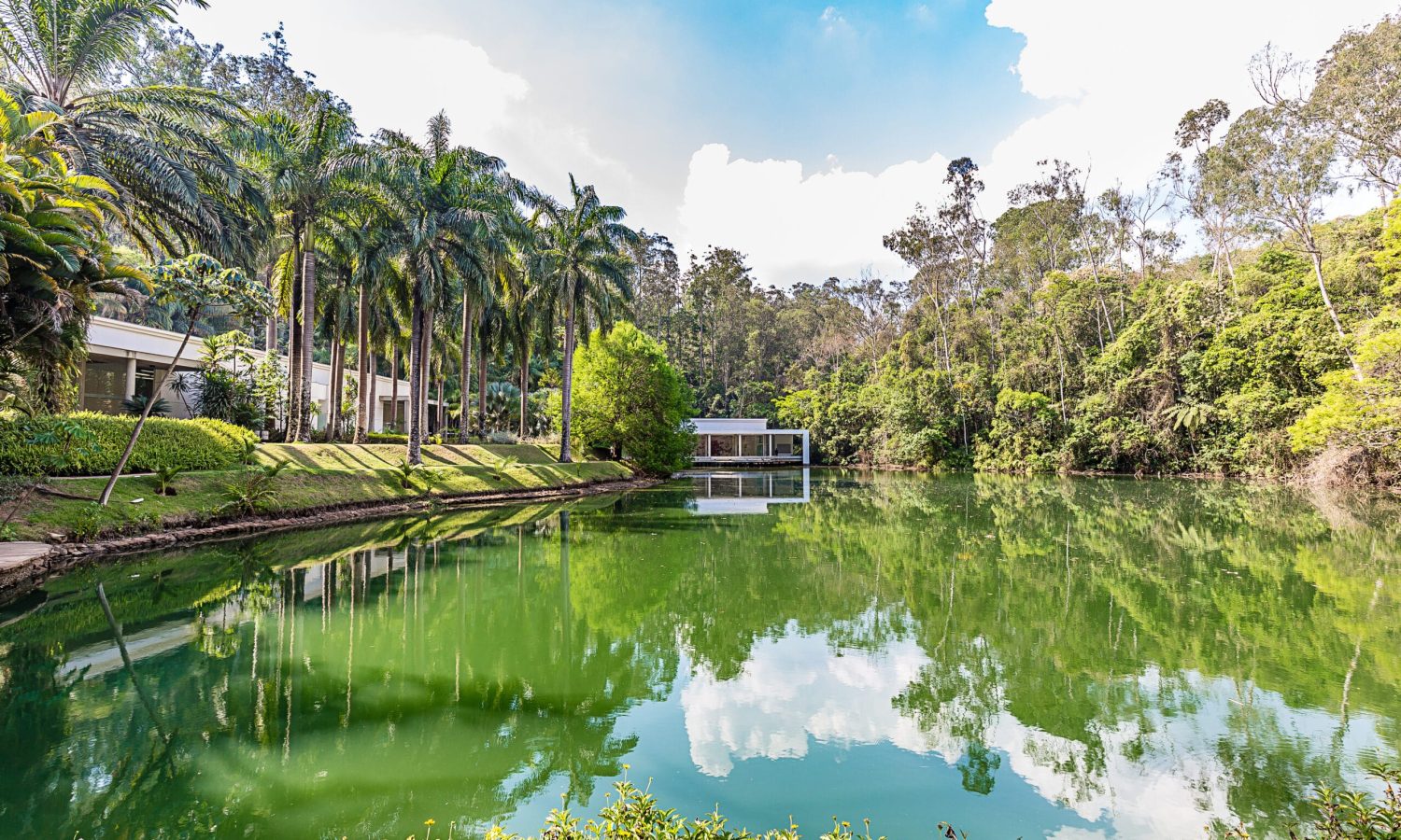 Brumadinho, Minas Gerais, Brazil. View of Inhotim Gardens and lake